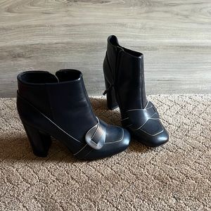 Tory Burch blue high heel boots.